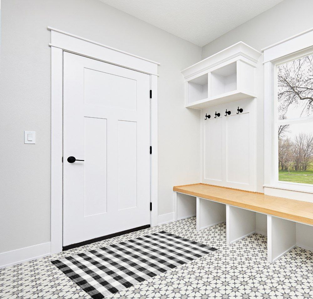 Front porch rugs ideas in White Modern Entryway