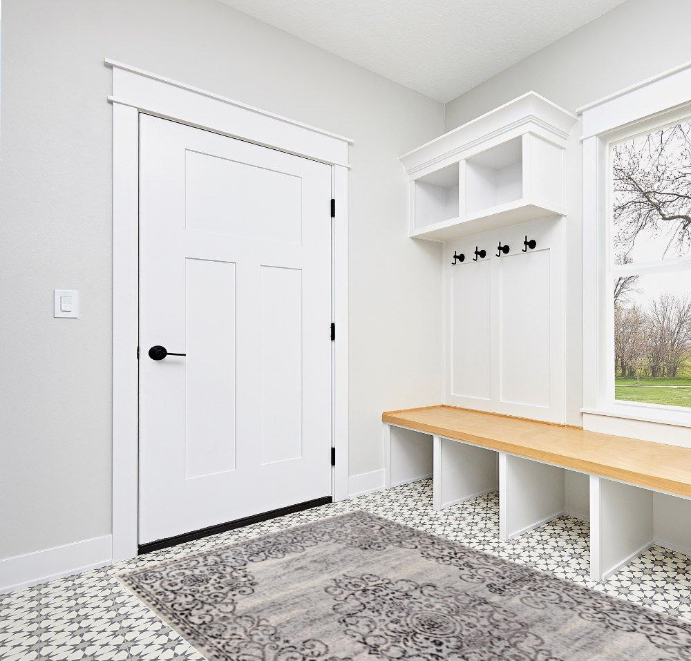 Rug ideas in White Modern Entryway