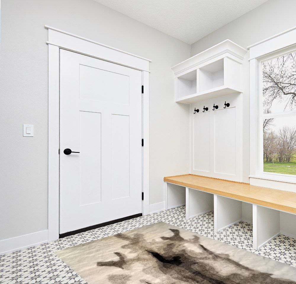Rug ideas in White Modern Entryway