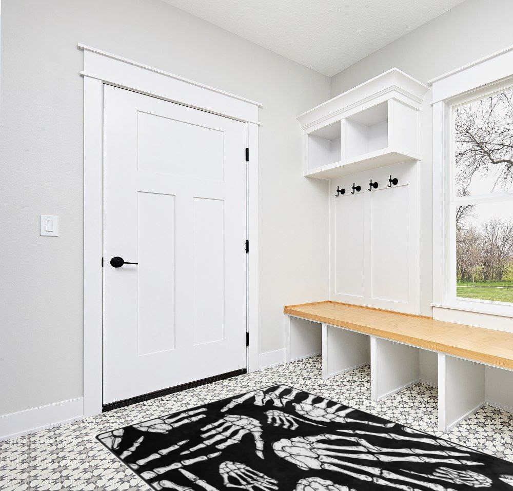 Black and white rug ideas in White Modern Entryway