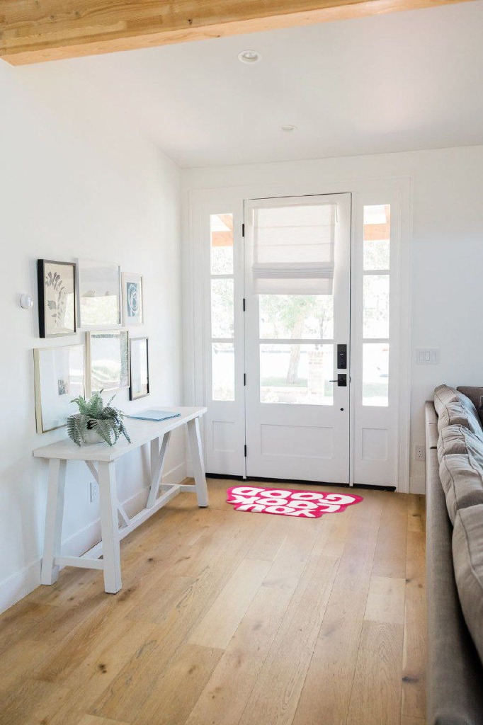 Cool rug ideas in White Scandinavian Entryway