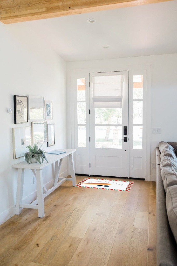 Rug ideas in White Scandinavian Entryway