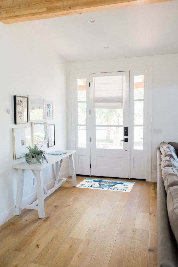Entryway rug ideas in White Scandinavian Entryway