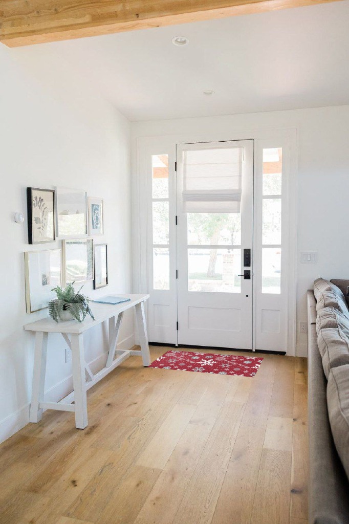 Entryway rug ideas in White Scandinavian Entryway