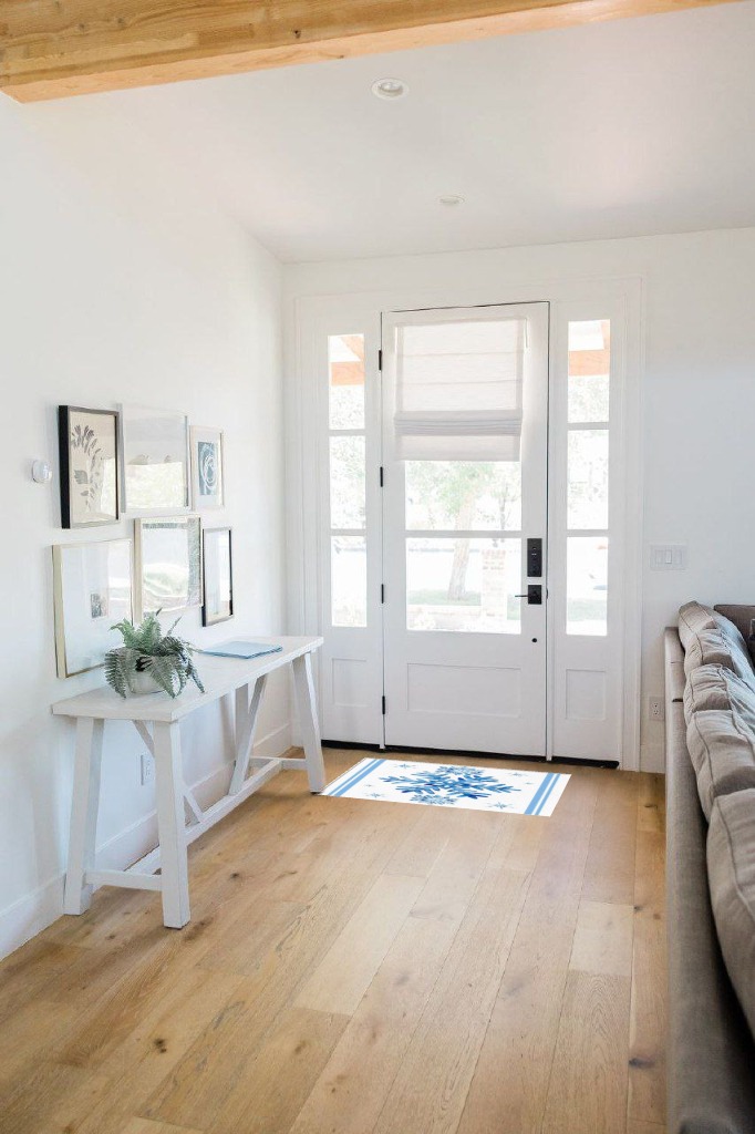 Entryway rug ideas in White Scandinavian Entryway