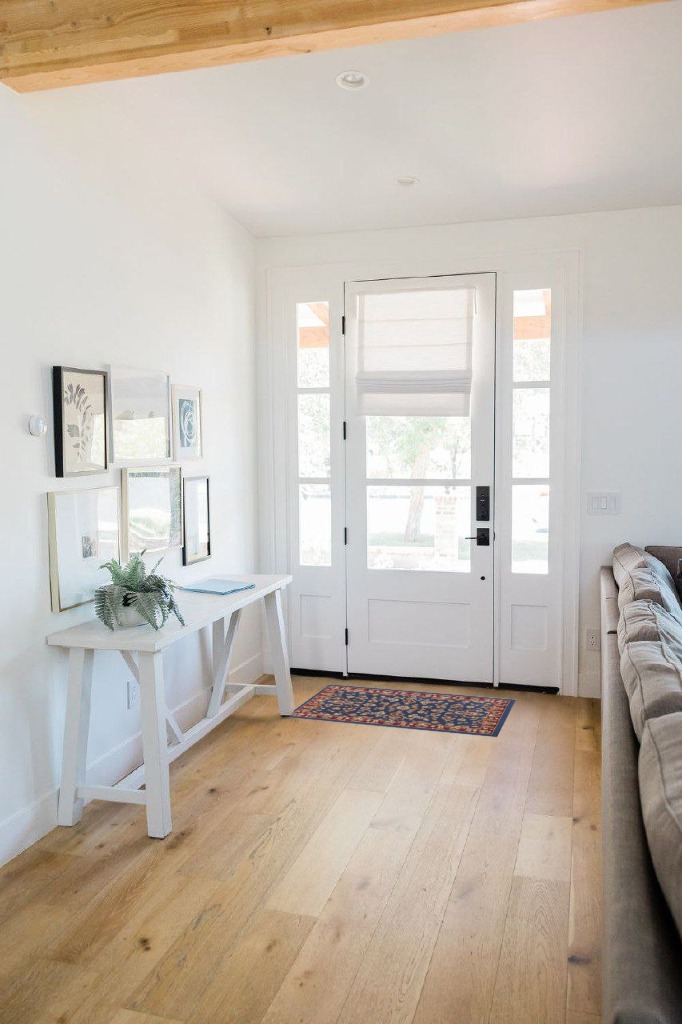 Oriental rug decorating ideas in White Scandinavian Entryway