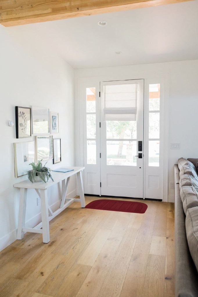 Rug ideas in White Scandinavian Entryway