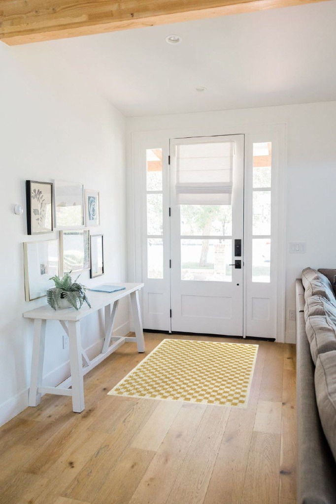 Rug ideas in White Scandinavian Entryway