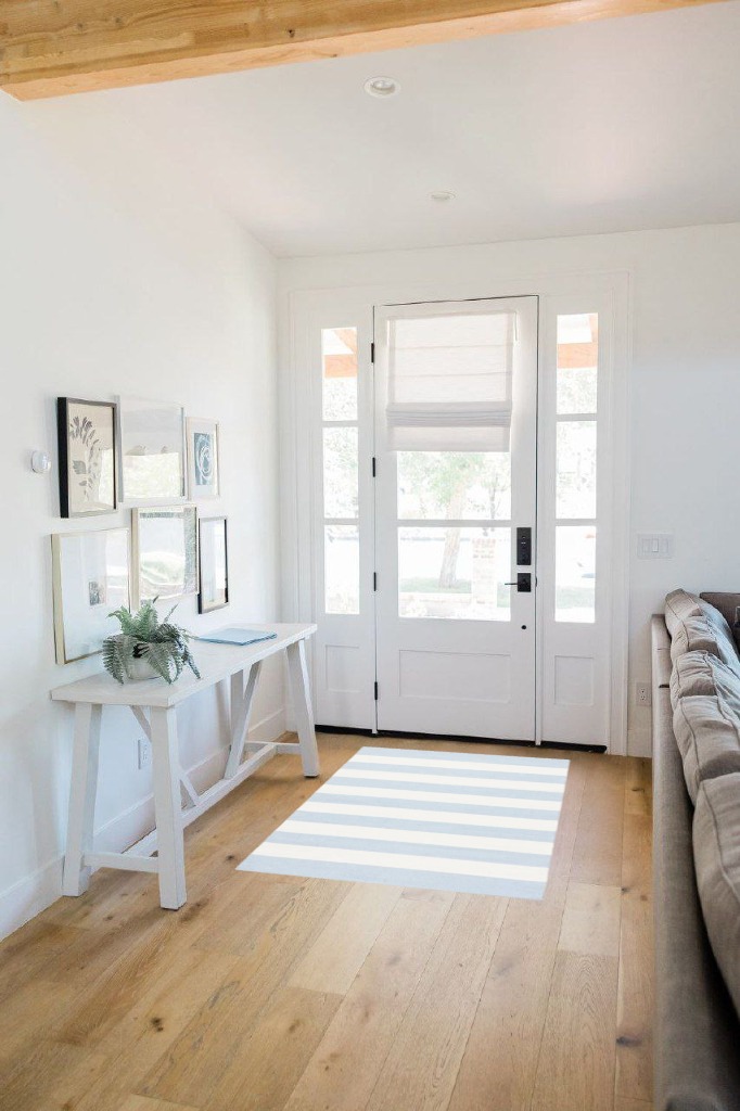 Rug ideas in White Scandinavian Entryway