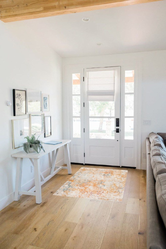 Rug ideas in White Scandinavian Entryway