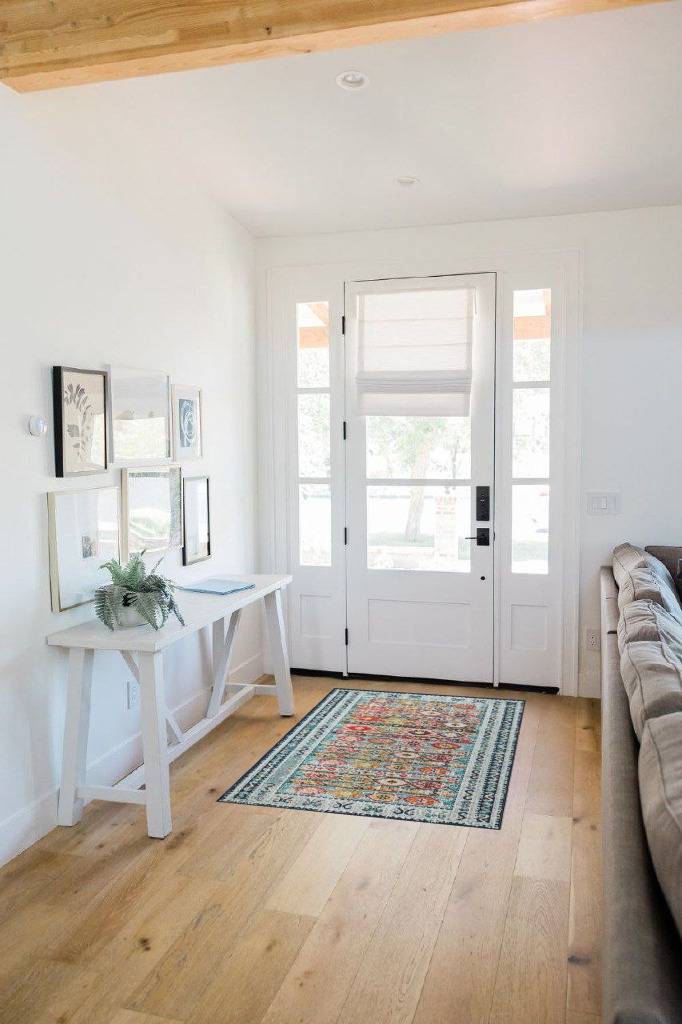 Rug ideas in White Scandinavian Entryway