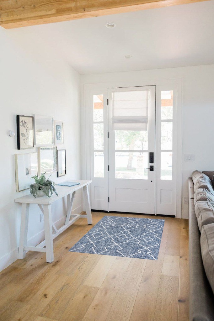 Rug ideas in White Scandinavian Entryway