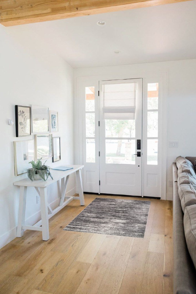 Rug ideas in White Scandinavian Entryway