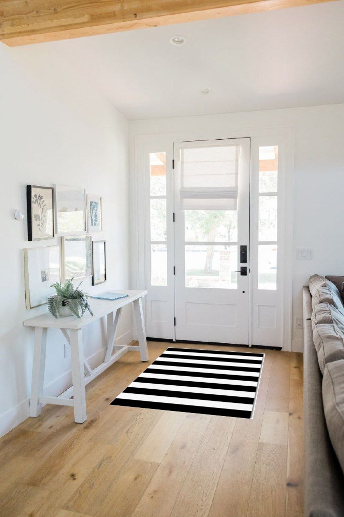 Rug ideas in White Scandinavian Entryway