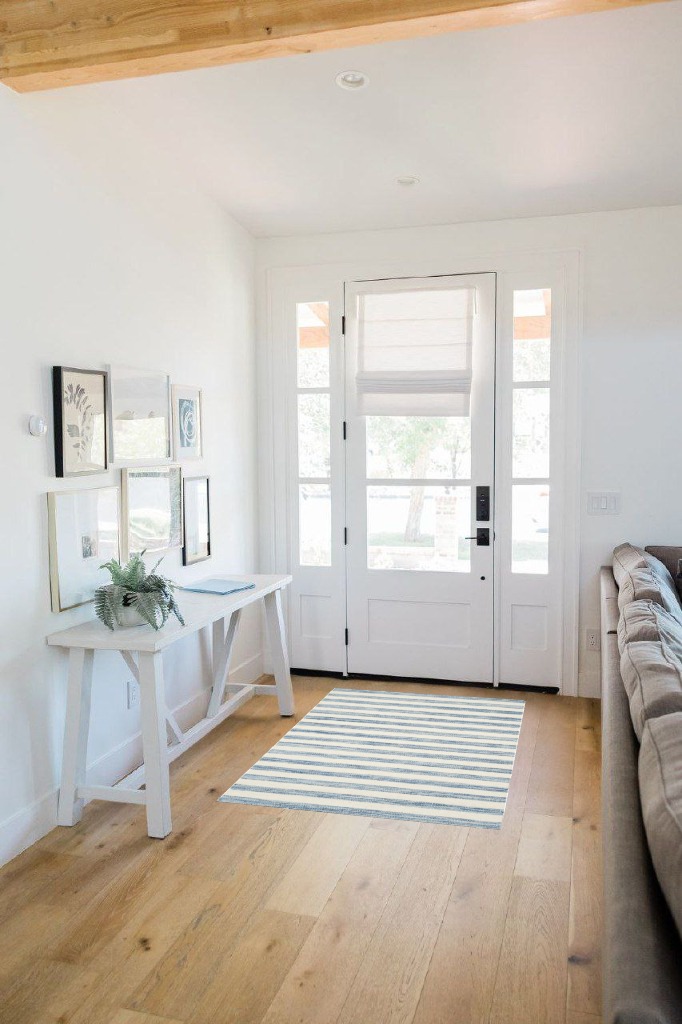 Rug ideas in White Scandinavian Entryway
