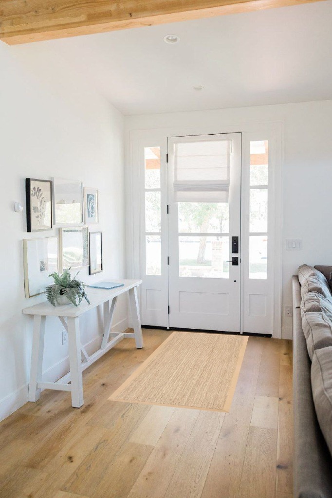Farmhouse rug ideas in White Scandinavian Entryway