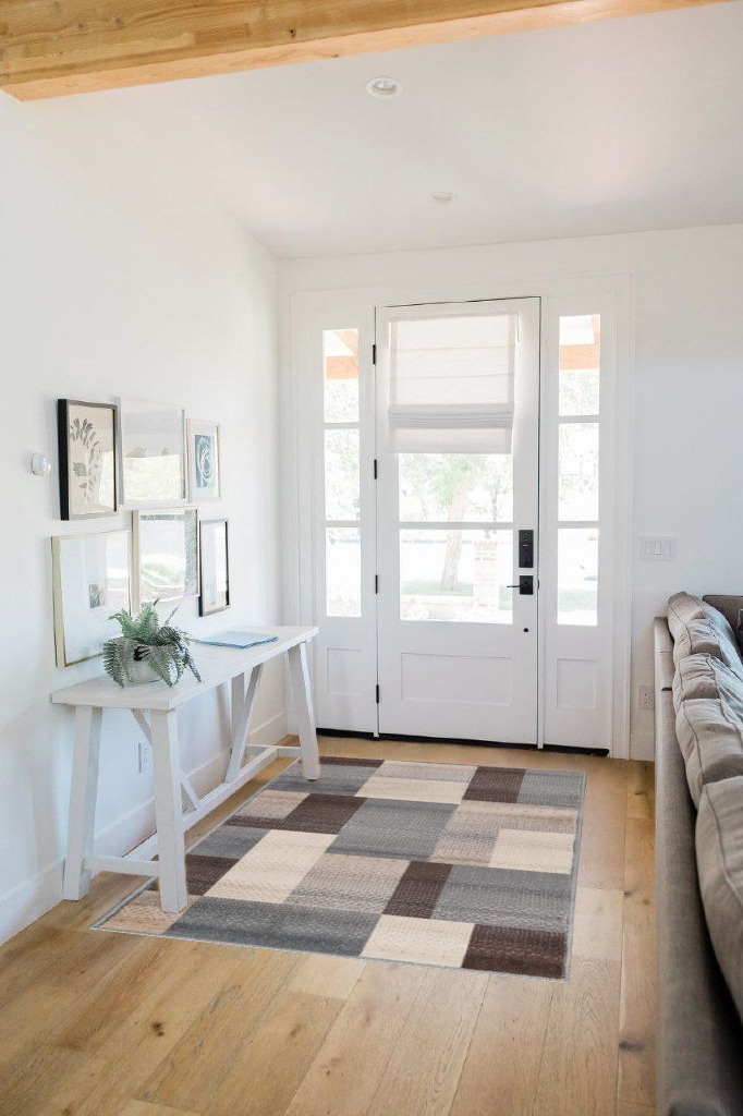 Small powder room rug ideas in White Scandinavian Entryway