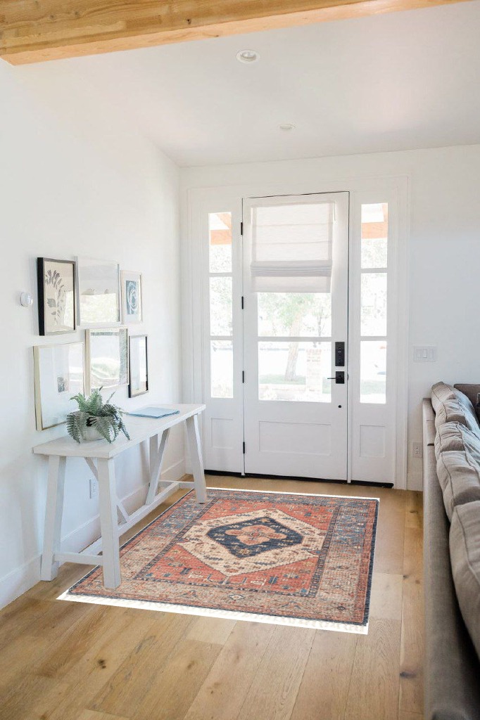 Small powder room rug ideas in White Scandinavian Entryway