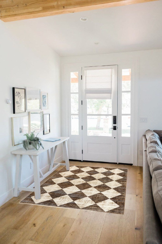 Modern area rug ideas in White Scandinavian Entryway