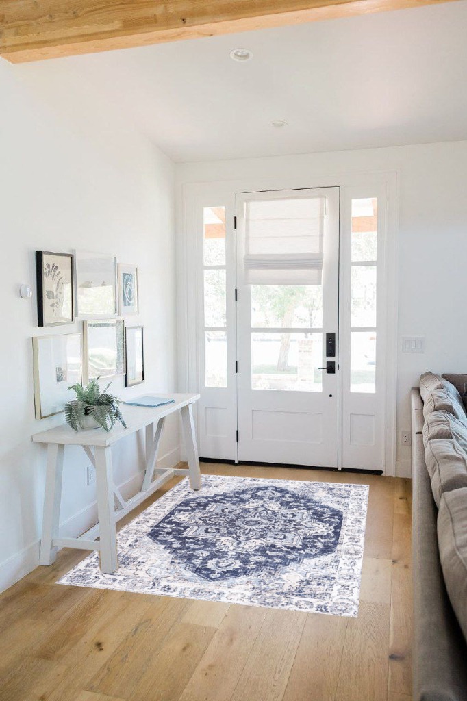 Farmhouse rug ideas in White Scandinavian Entryway