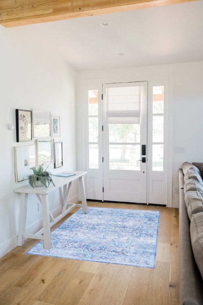 Rug ideas in White Scandinavian Entryway