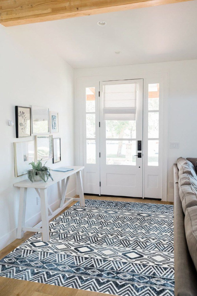 Rug ideas in White Scandinavian Entryway