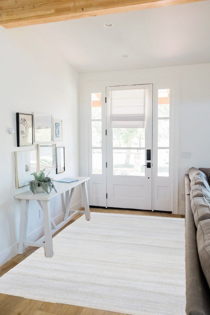 Rug ideas in White Scandinavian Entryway