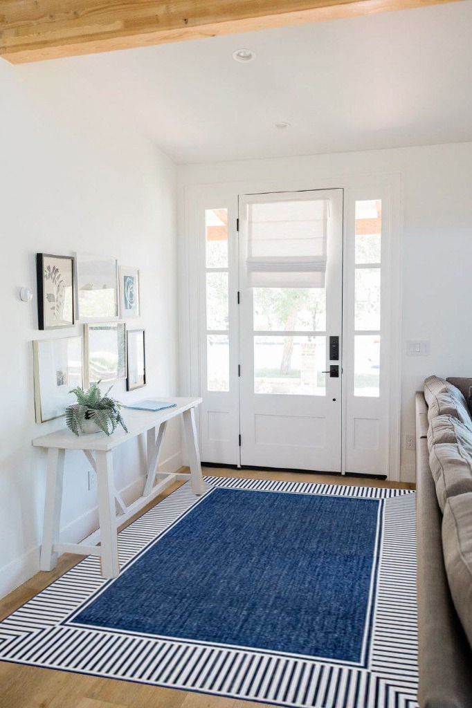 Rug ideas in White Scandinavian Entryway