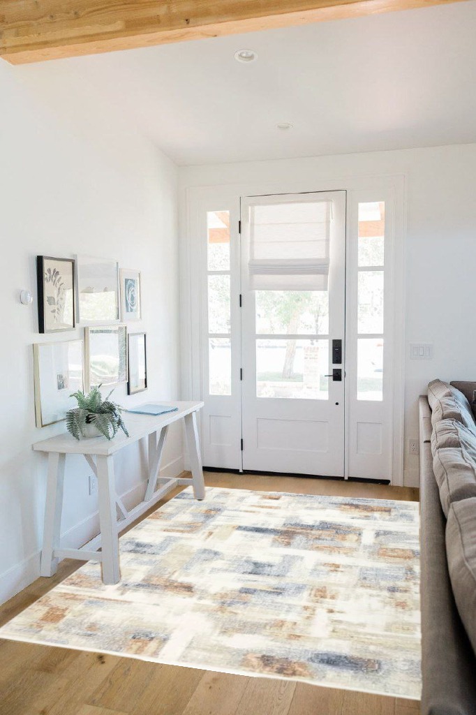 Rug ideas in White Scandinavian Entryway