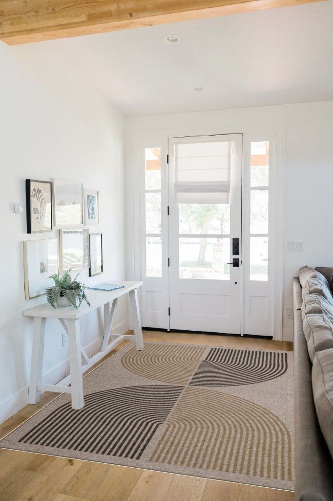 Modern area rug ideas in White Scandinavian Entryway