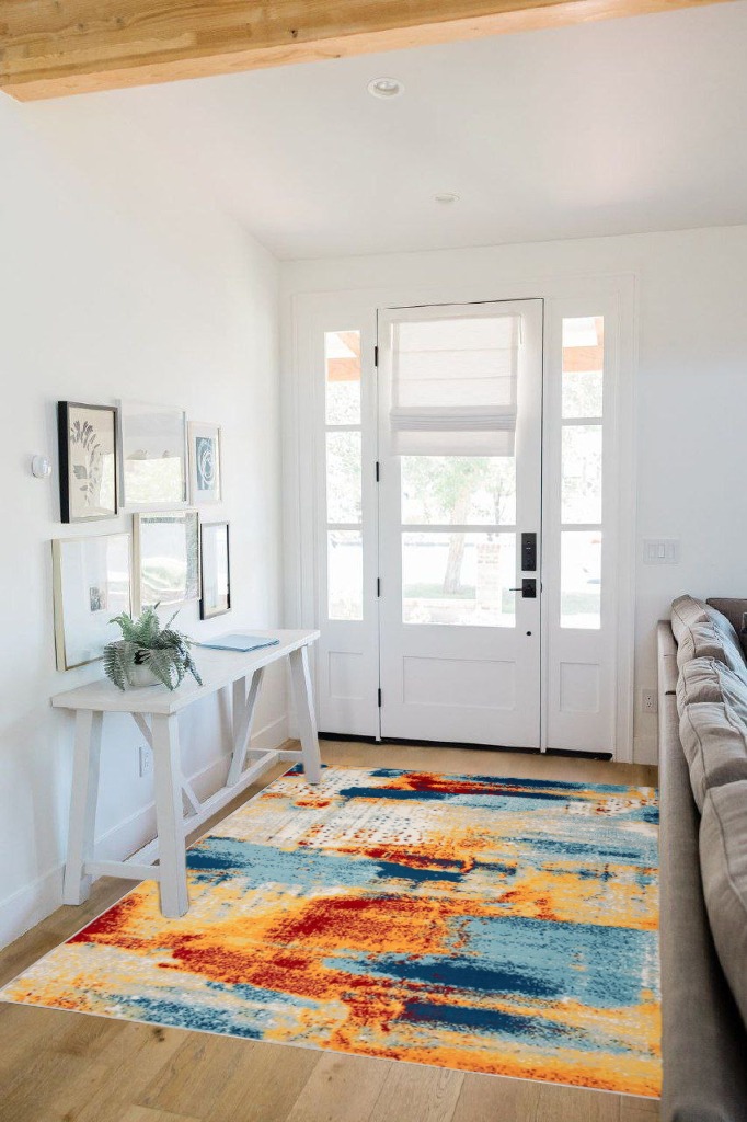 Modern area rug ideas in White Scandinavian Entryway