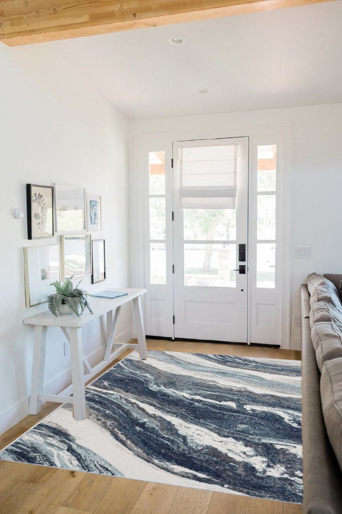 Rug ideas in White Scandinavian Entryway