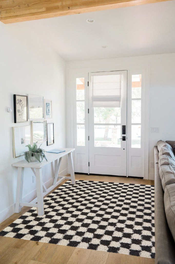 Modern area rug ideas in White Scandinavian Entryway