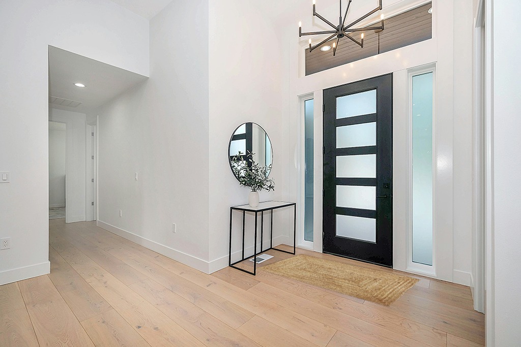 Farmhouse rug ideas in Modern White Entryway