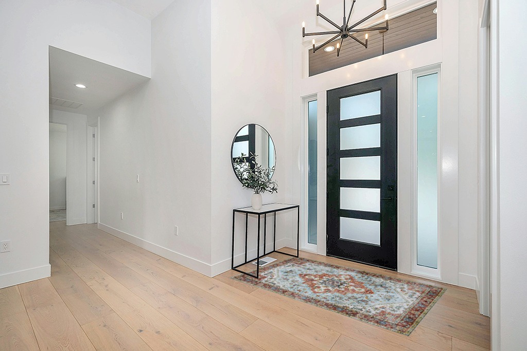 Rug ideas in Modern White Entryway