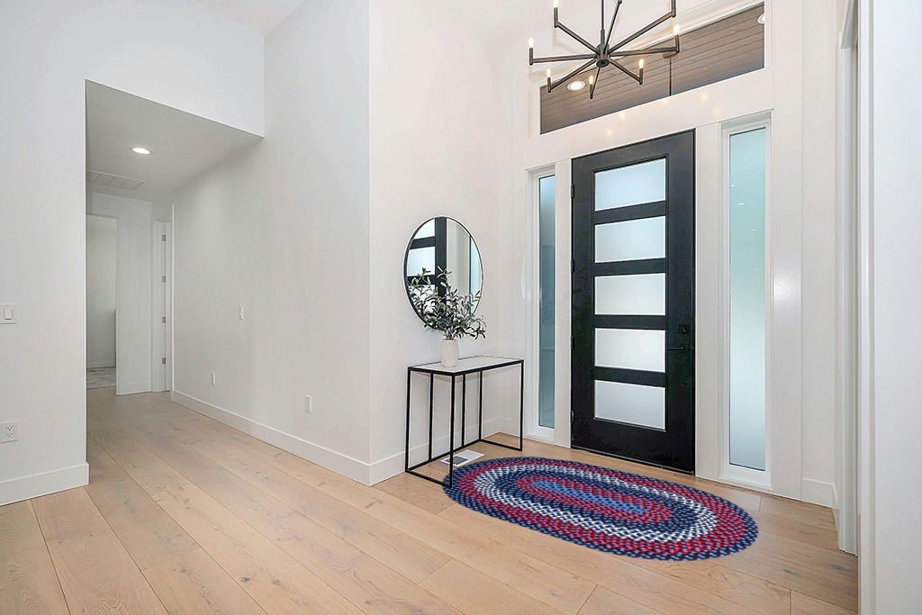 Rug ideas in Modern White Entryway