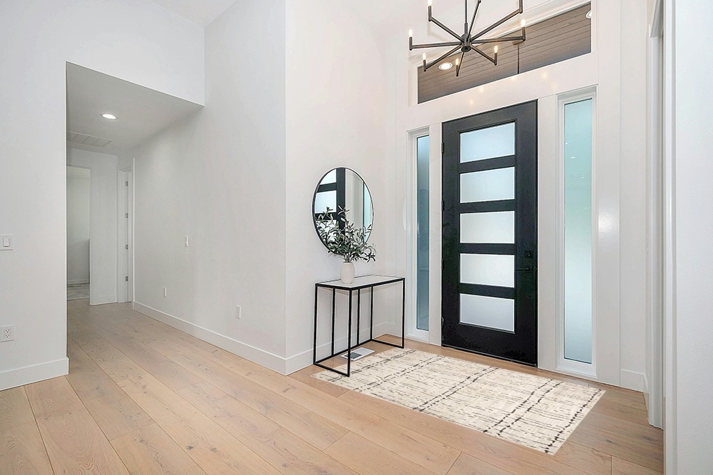 Rug ideas in Modern White Entryway