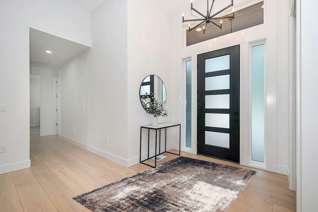 Rug ideas in Modern White Entryway