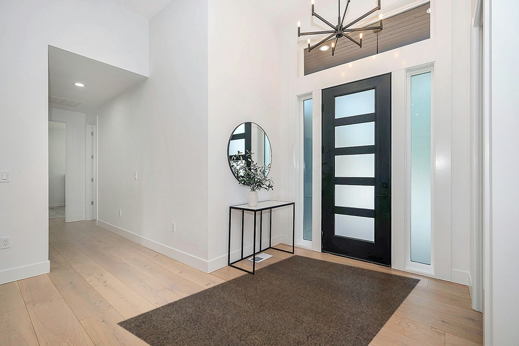 Rug ideas in Modern White Entryway