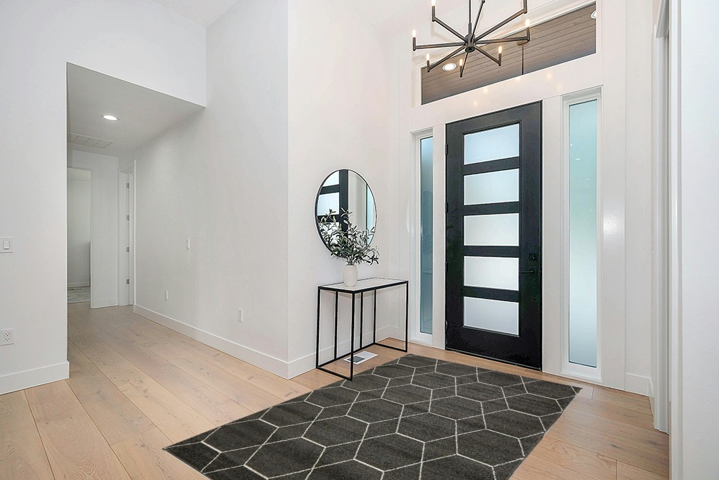 Rug ideas in Modern White Entryway