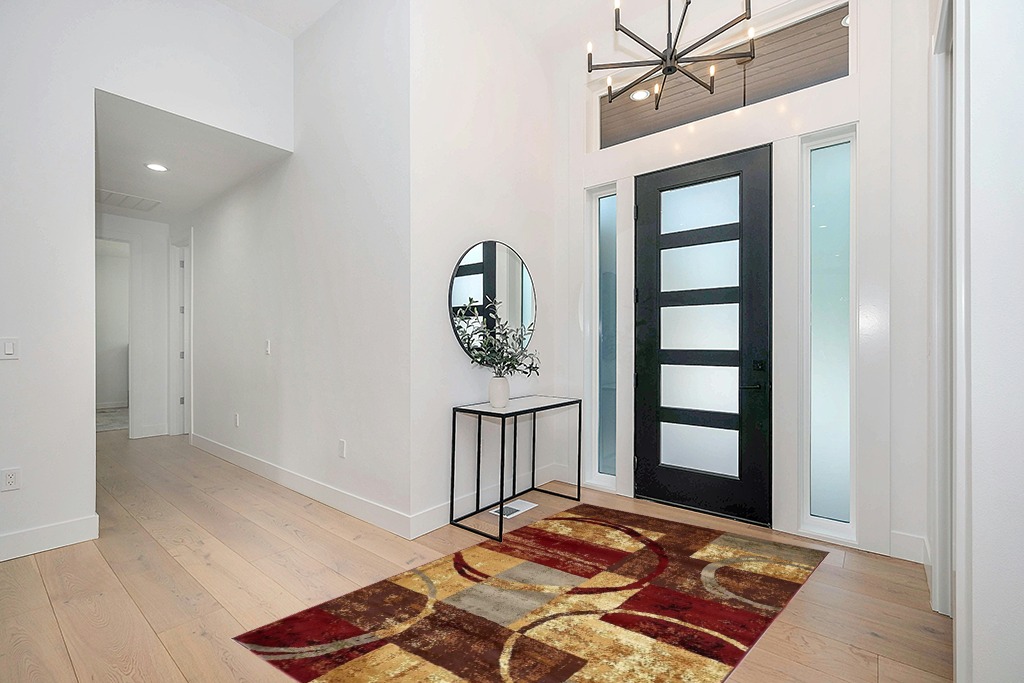 Rug ideas in Modern White Entryway