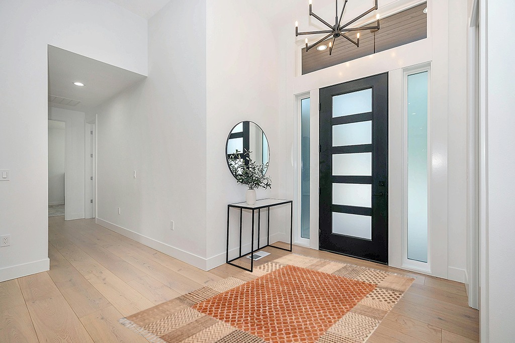 Rug ideas in Modern White Entryway