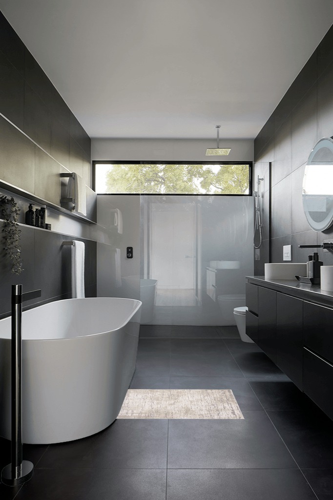 Modern area rug ideas in Black Modern Bathroom