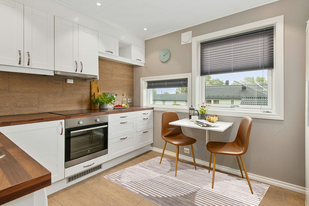 Modern area rug ideas in Wood and White Small Kitchen