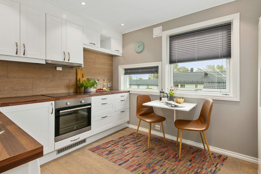 Cowhide rug decor ideas in Wood and White Small Kitchen