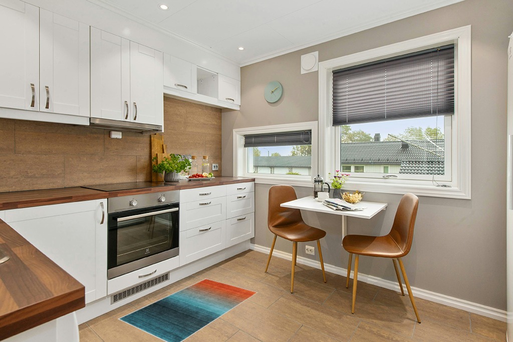 Modern area rug ideas in Wood and White Small Kitchen