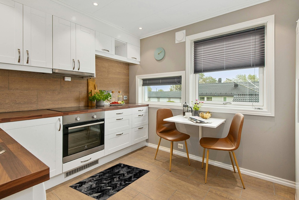 Cowhide rug decor ideas in Wood and White Small Kitchen