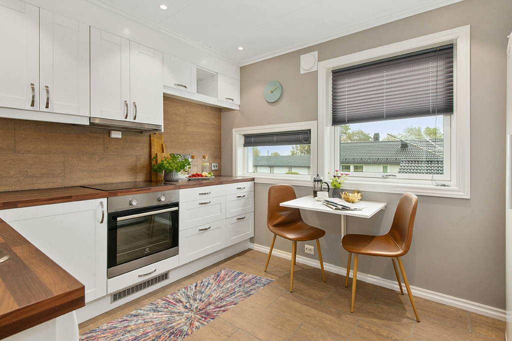 Modern area rug ideas in Wood and White Small Kitchen