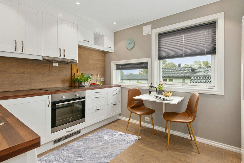Modern area rug ideas in Wood and White Small Kitchen