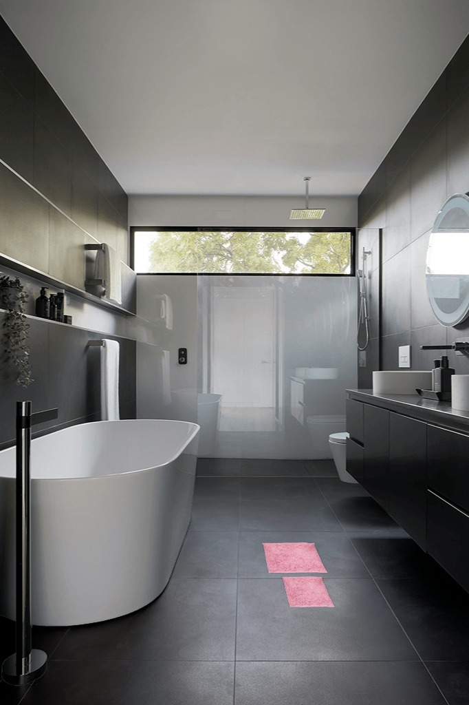 Small bathroom rug ideas in Black Modern Bathroom